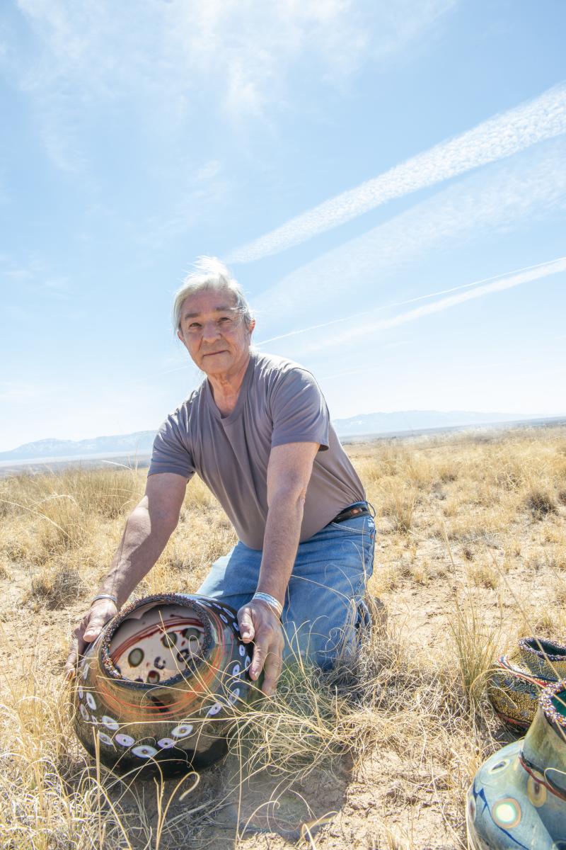 Tony Jojola with one of his masterworks at Isleta Pueblo