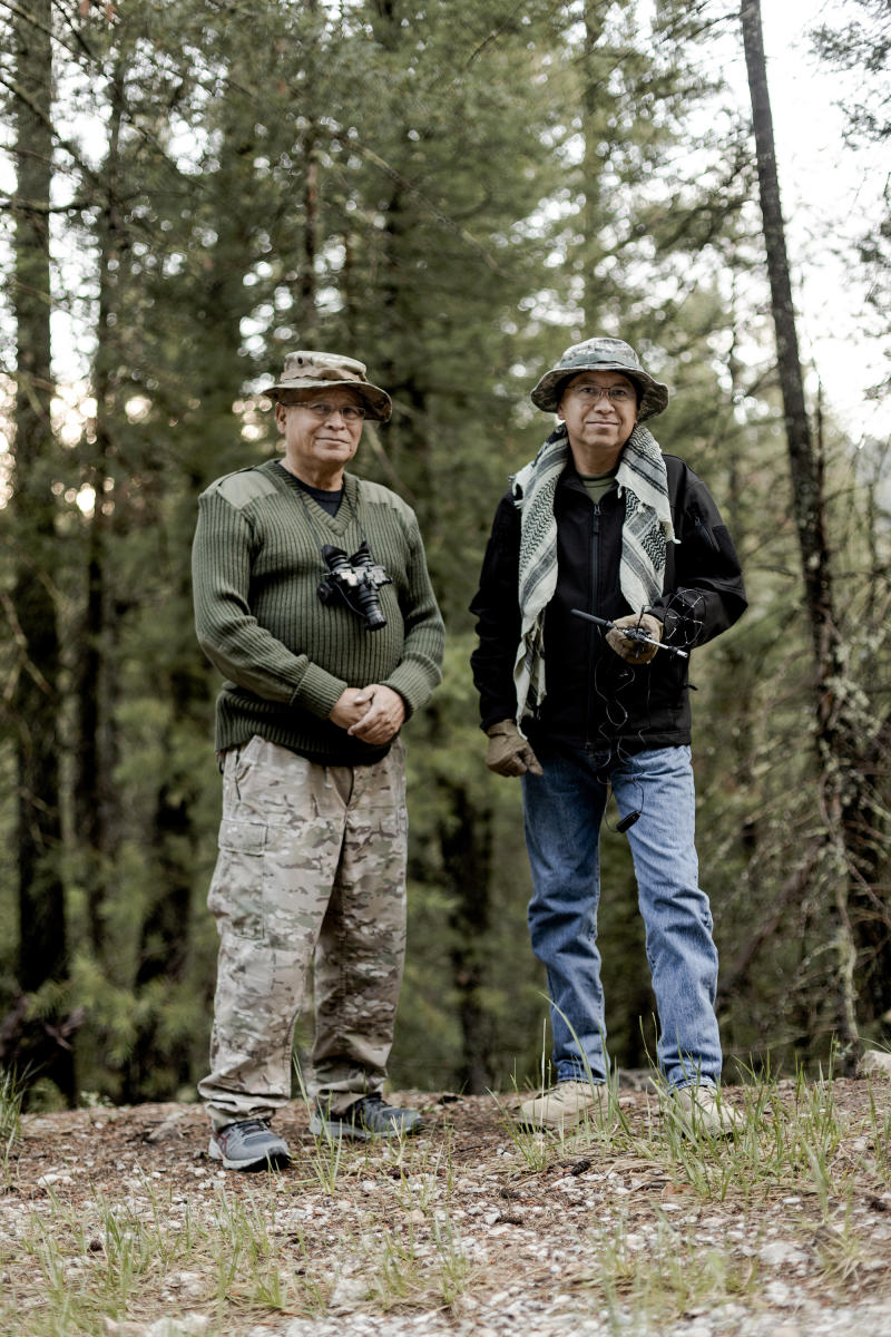 Jonathan Dover and Stanley Milford Jr. in the field. Dover attempts to capture Bigfoot audio.