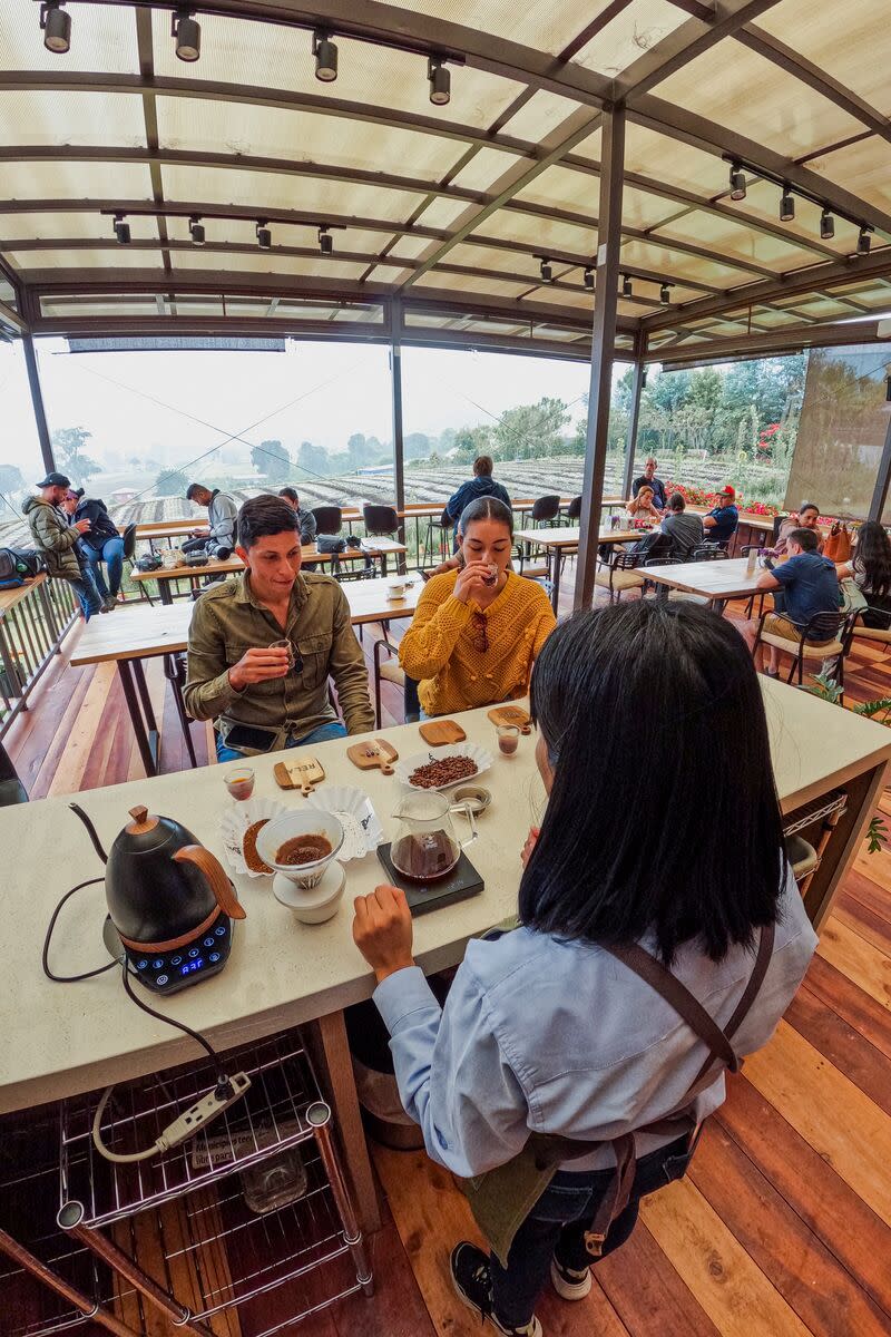Visitors enjoying the coffee tasting at coffee shop Cerro Punta.