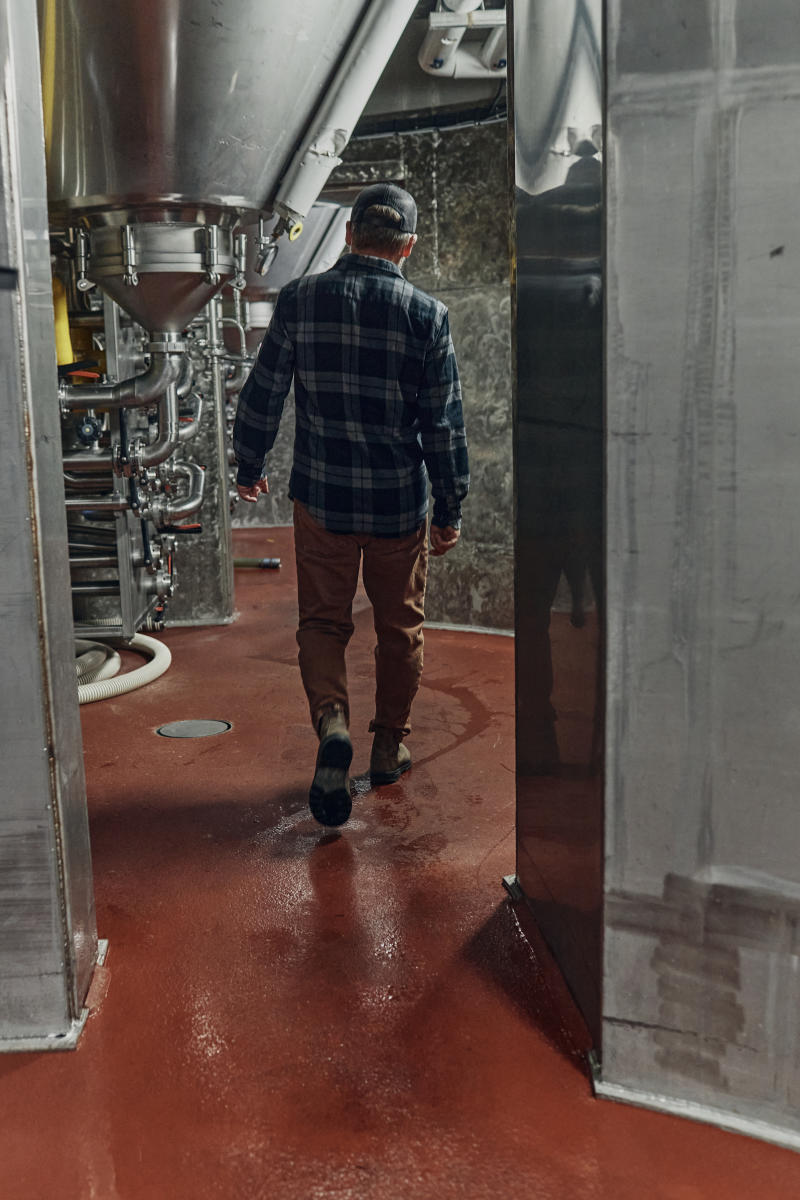 Matt Brynildson walks through brewery tanks