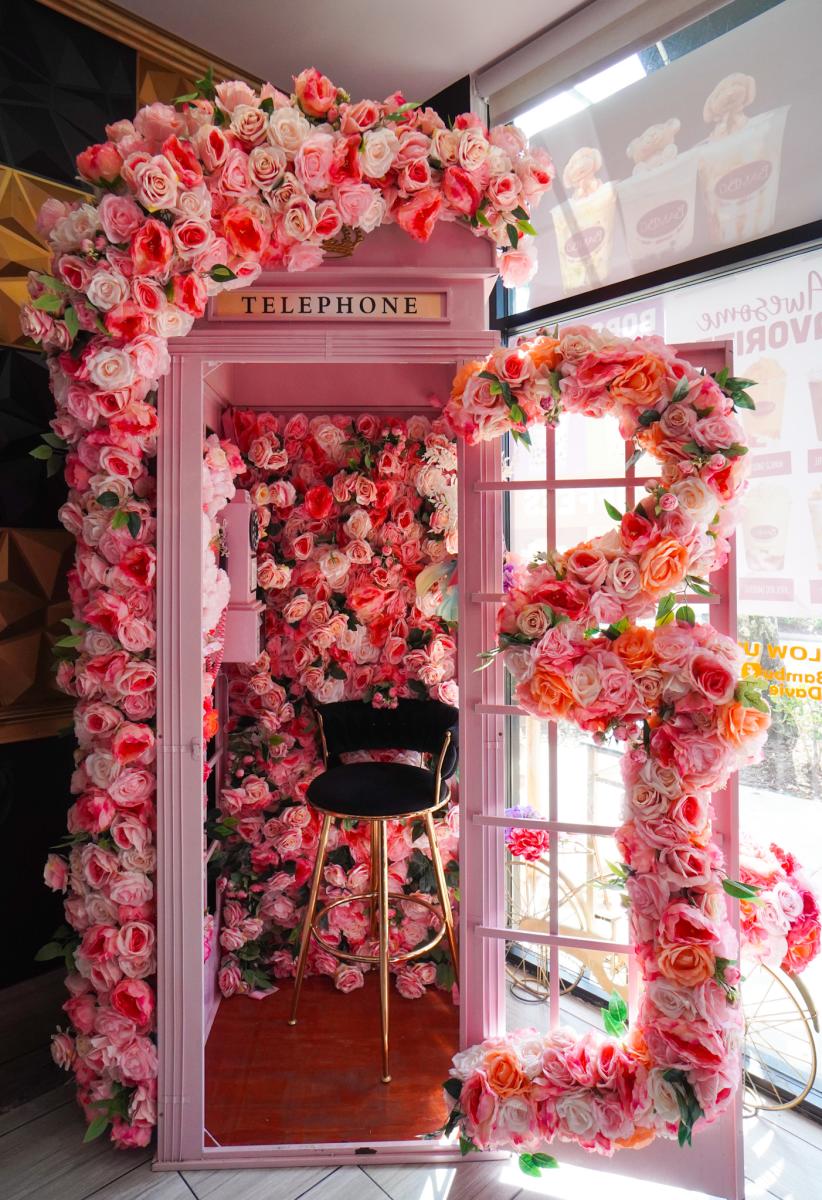 Flower Arrangement In A Telephone Booth At Bambu In Davie, FL