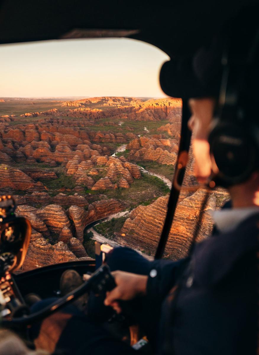 HeliSpirit helicopter flying over the domes in the Bungles