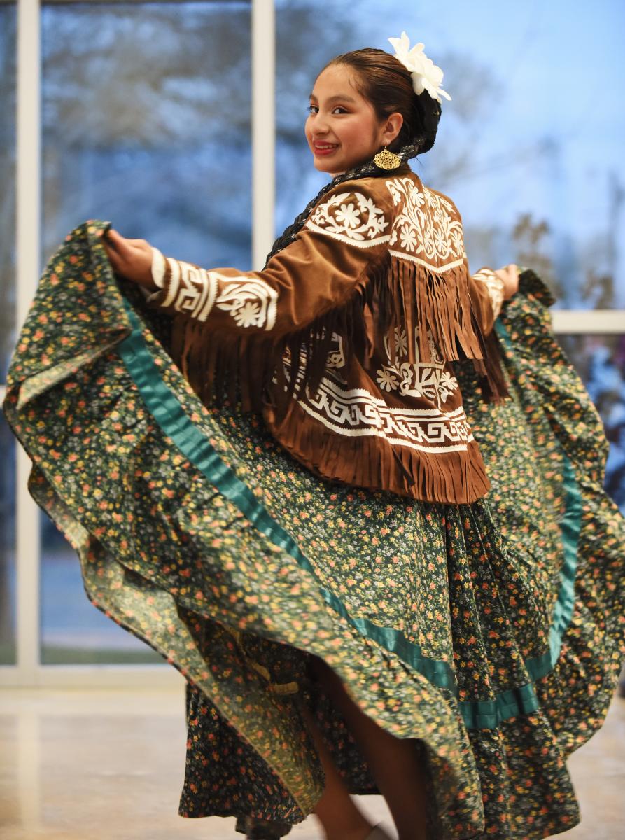 Folklórico Dancer at the Lost Pines Art Center in Downtown Bastrop during the Gathering event hosted by the Bastrop Cultural Arts Commission in 2023