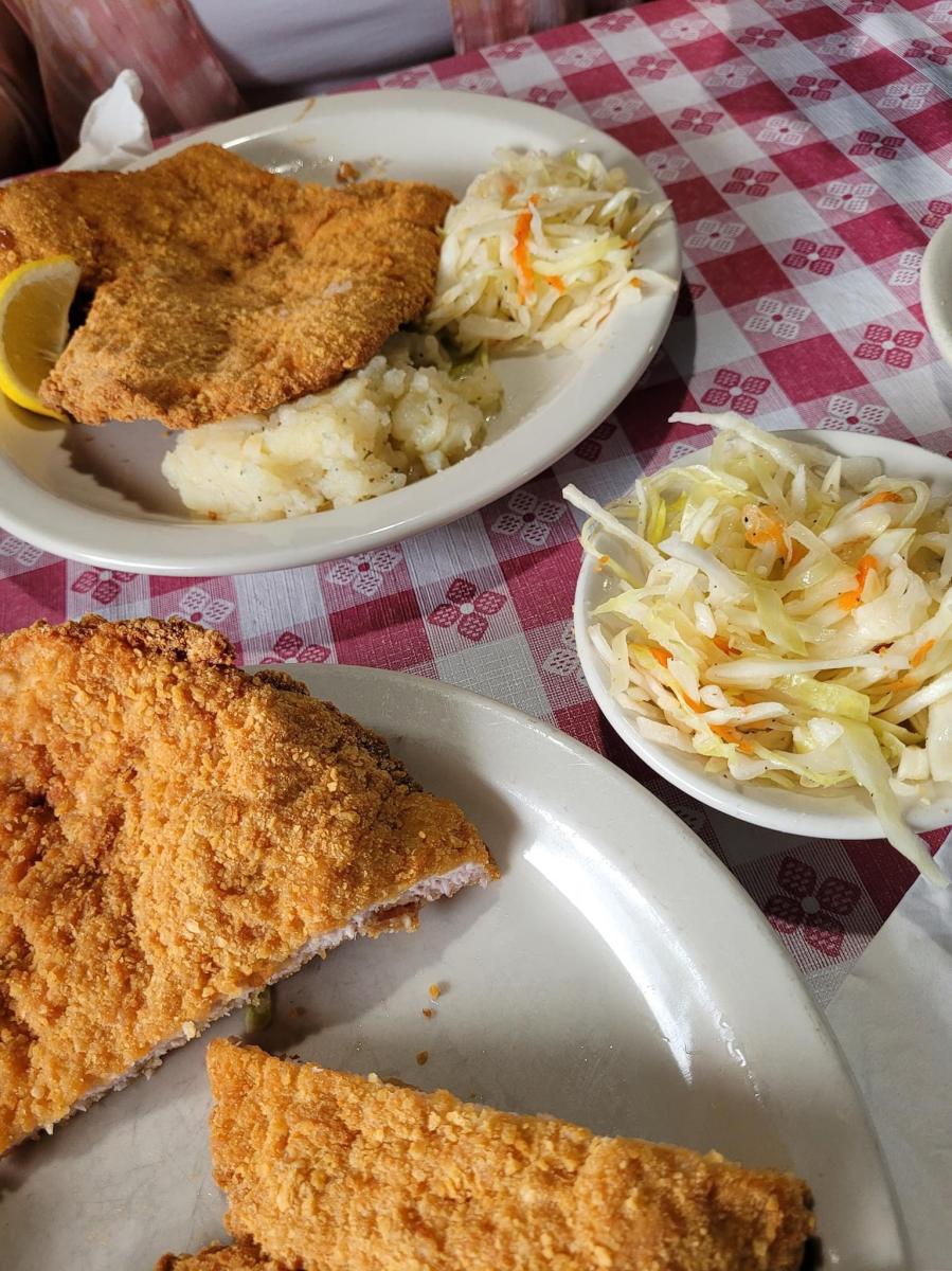 plates of schnitzel and German sides