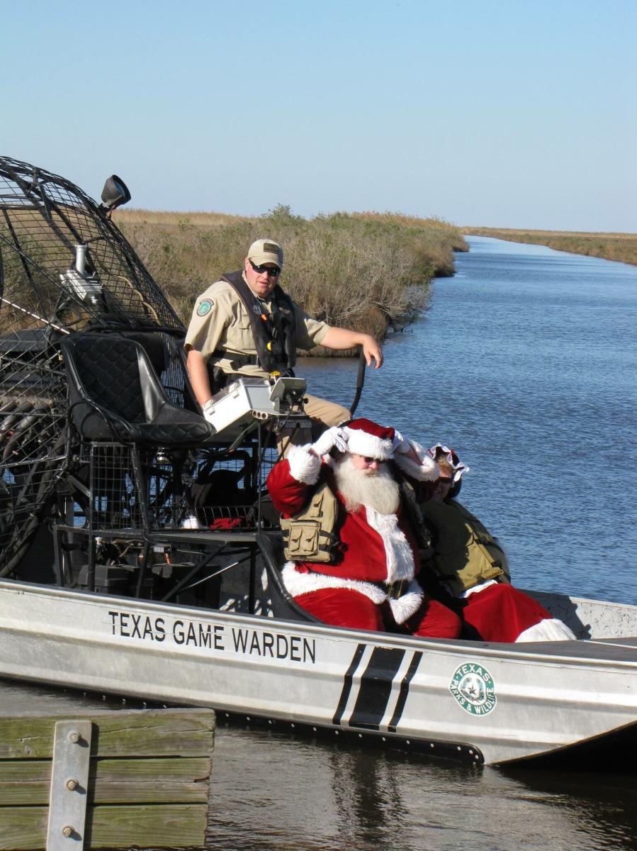 Santa rides an air boat in Port Arthur, TX