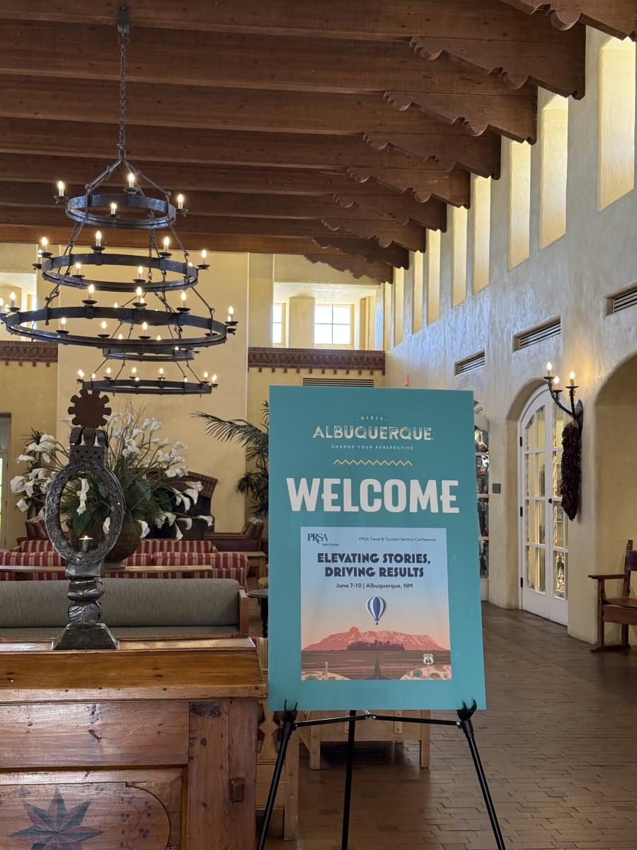A photo of the welcome sign for the PRSA Travel and Tourism conference at Hotel Albuquerque.