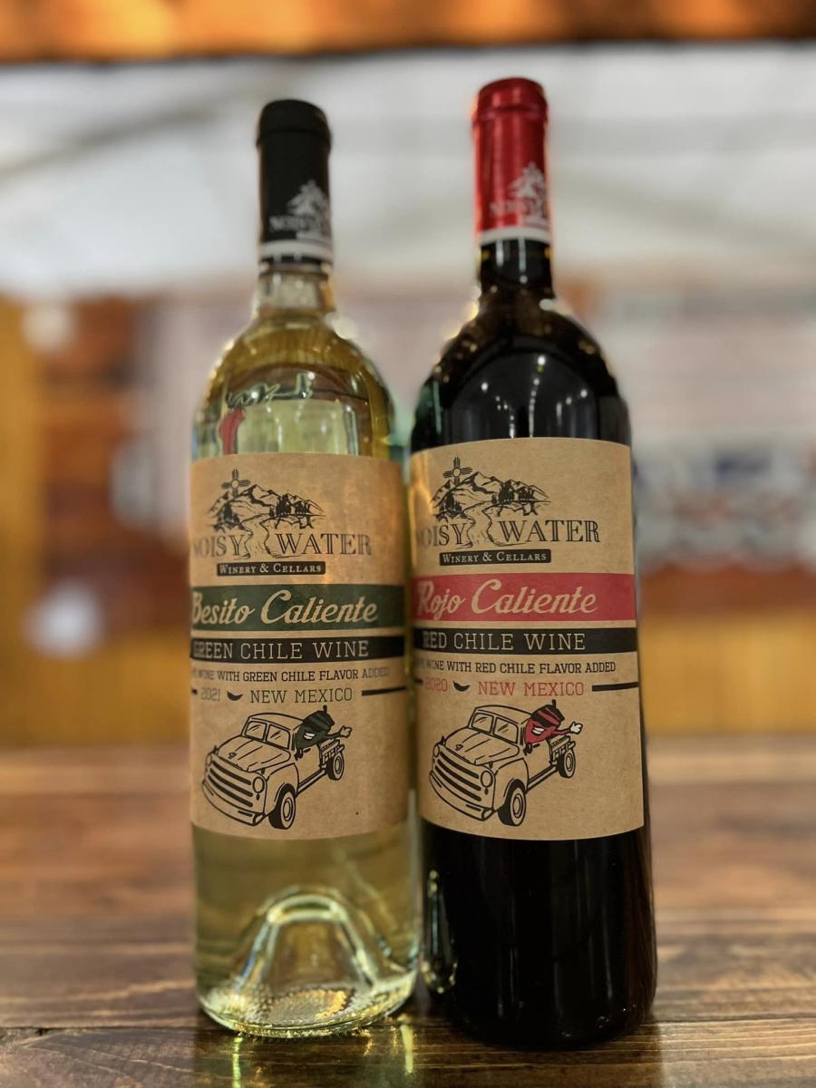 A bottle of green chile and red chile wine from Noisy Water Winery