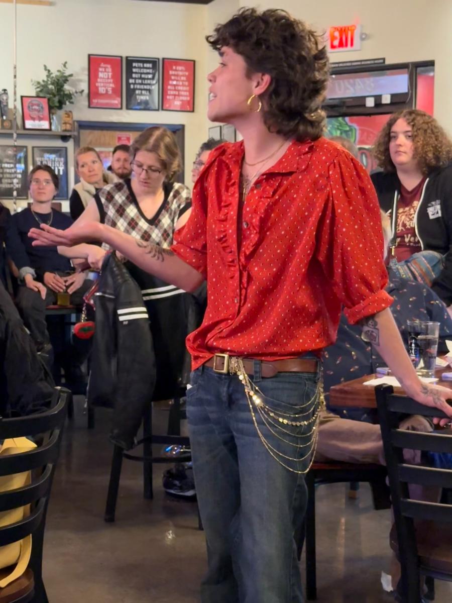 Noe Field-Perkins performs during Duke City Repertory Theatre's Bard Crawl "Comedy of Errors," while people in the brewery watch.