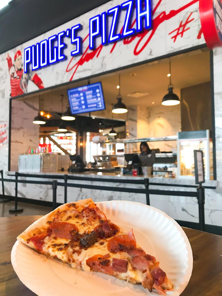 A slice of pizza from Pudge's Pizza inside Texas Live!