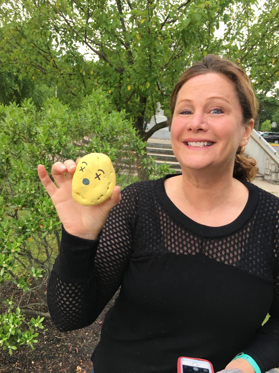 Elisa Baxt with painted rock