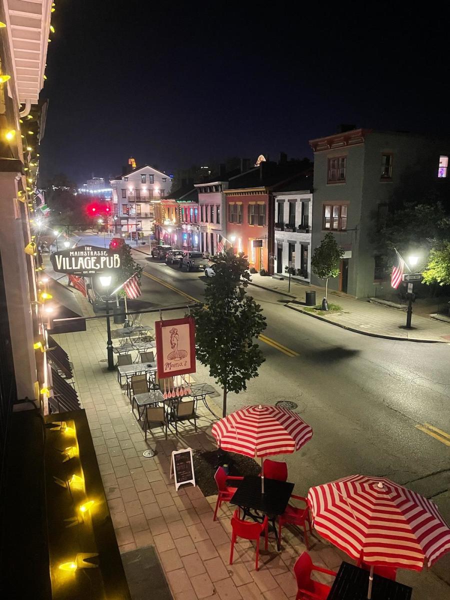 Second story view of Main Street in Mainstrasse Village at night