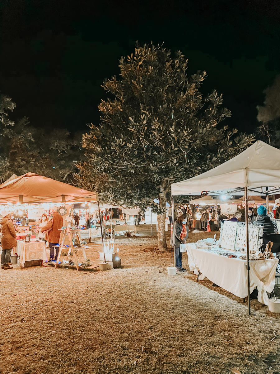 Lights illuminate the vendor stalls at the Olde Beaufort Farmer's Market.