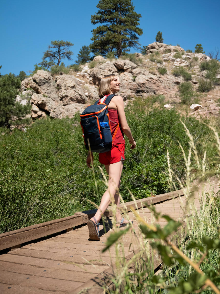 A hiker girl hikes on Arthur's Rock Trail at Lory State Park