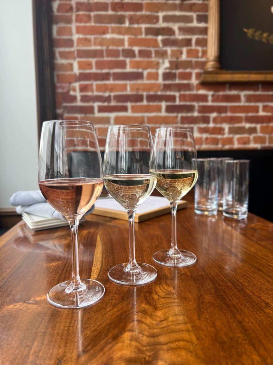 Three glasses of wine in a row