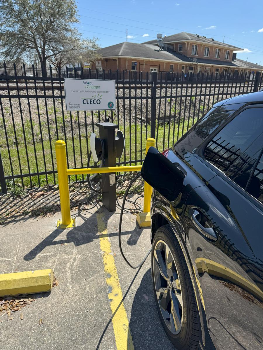 Car plugged into EV charger.