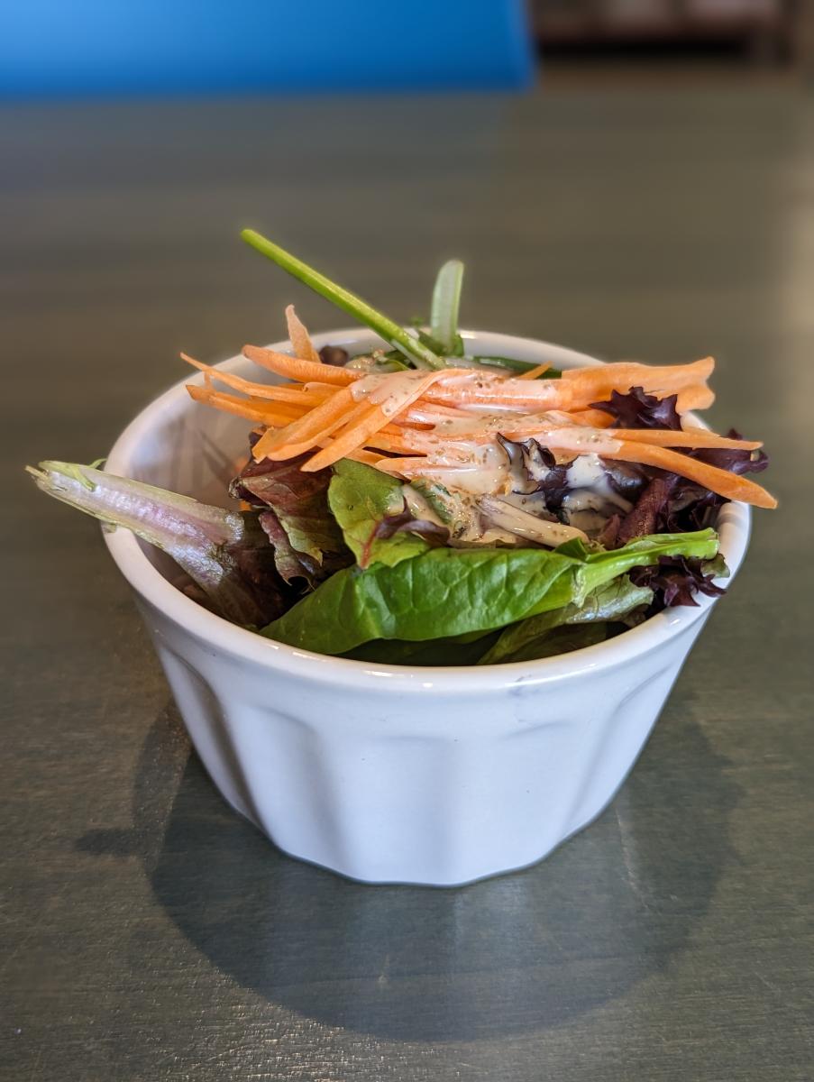 The image is of Thai Pavilion's house salad in a small, white bowl.