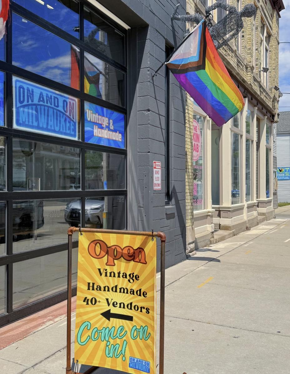 A Progress Pride flag hangs outside On and On Milwaukee, a vintage and handmade shop with more than 40 vendors.
