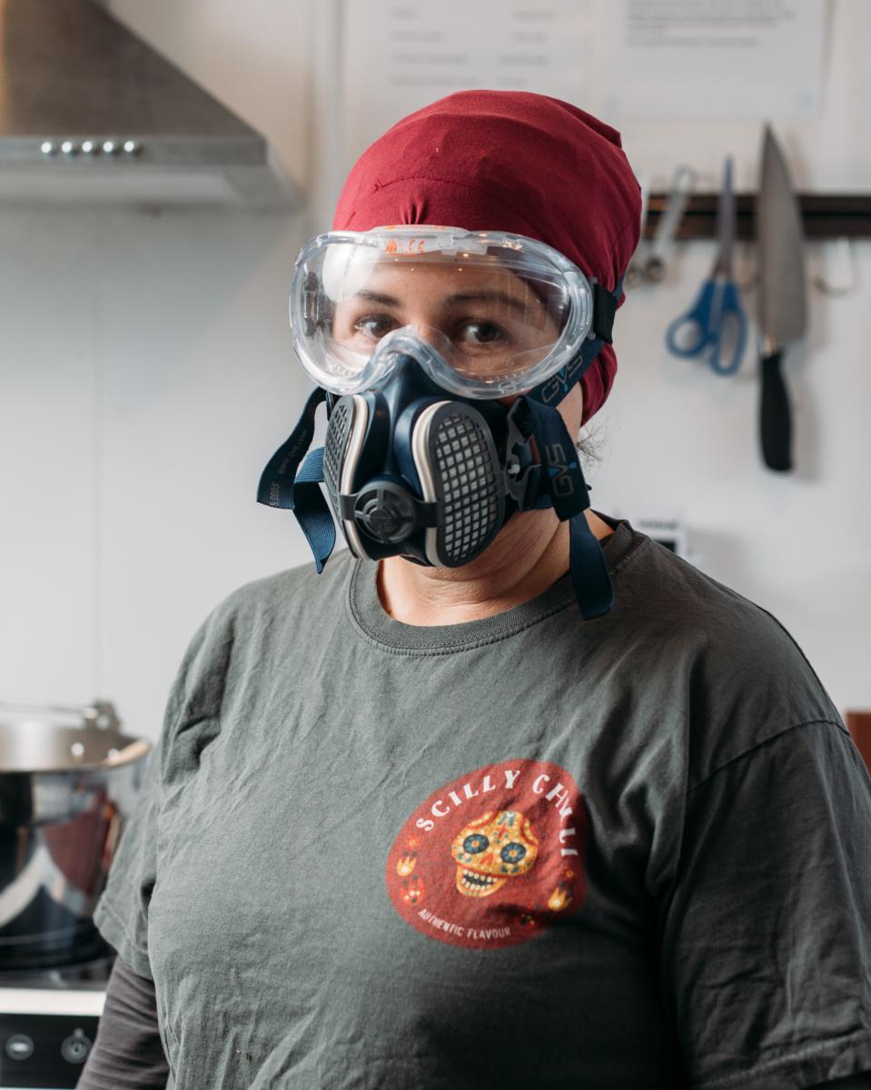 Ruth wearing a mask to deal with the hot chillies