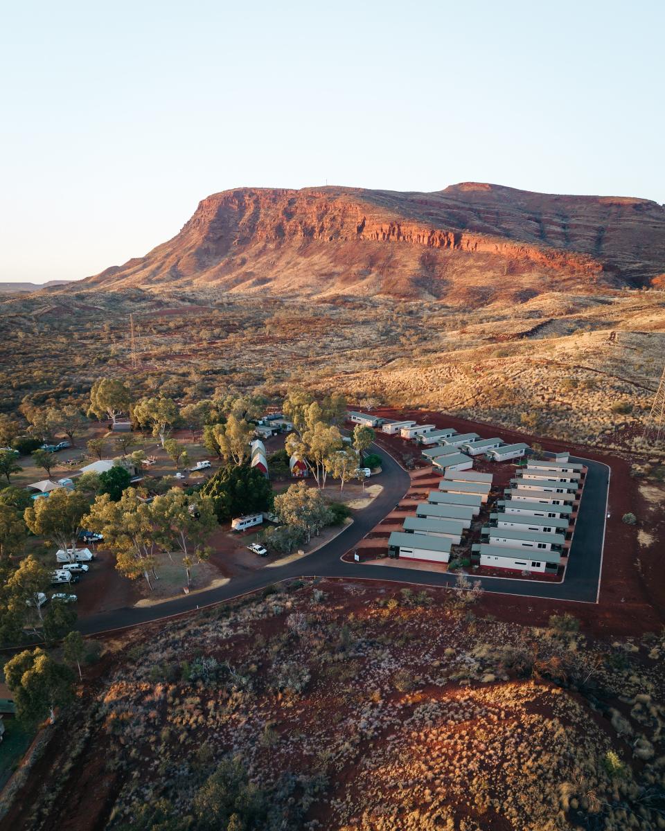 Aerial view of Summerstar Tom Price Tourist Park with Mt Nameless in the background