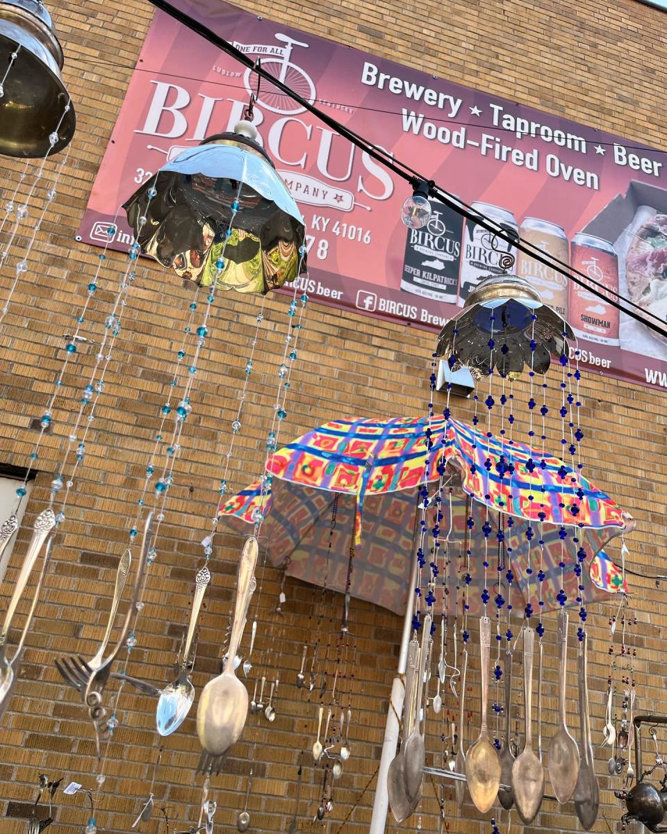 Image is of handmade windchimes with spoons for the Ludlow Flea & Craft Fair.