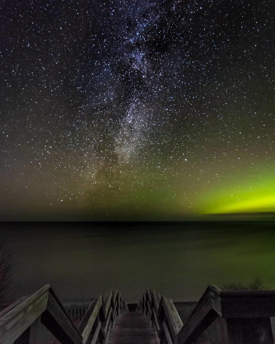 A nighttime image of the Northern Lights and the Milky Way from the Keweenaw, located in Michigan's Upper Peninsula, USA