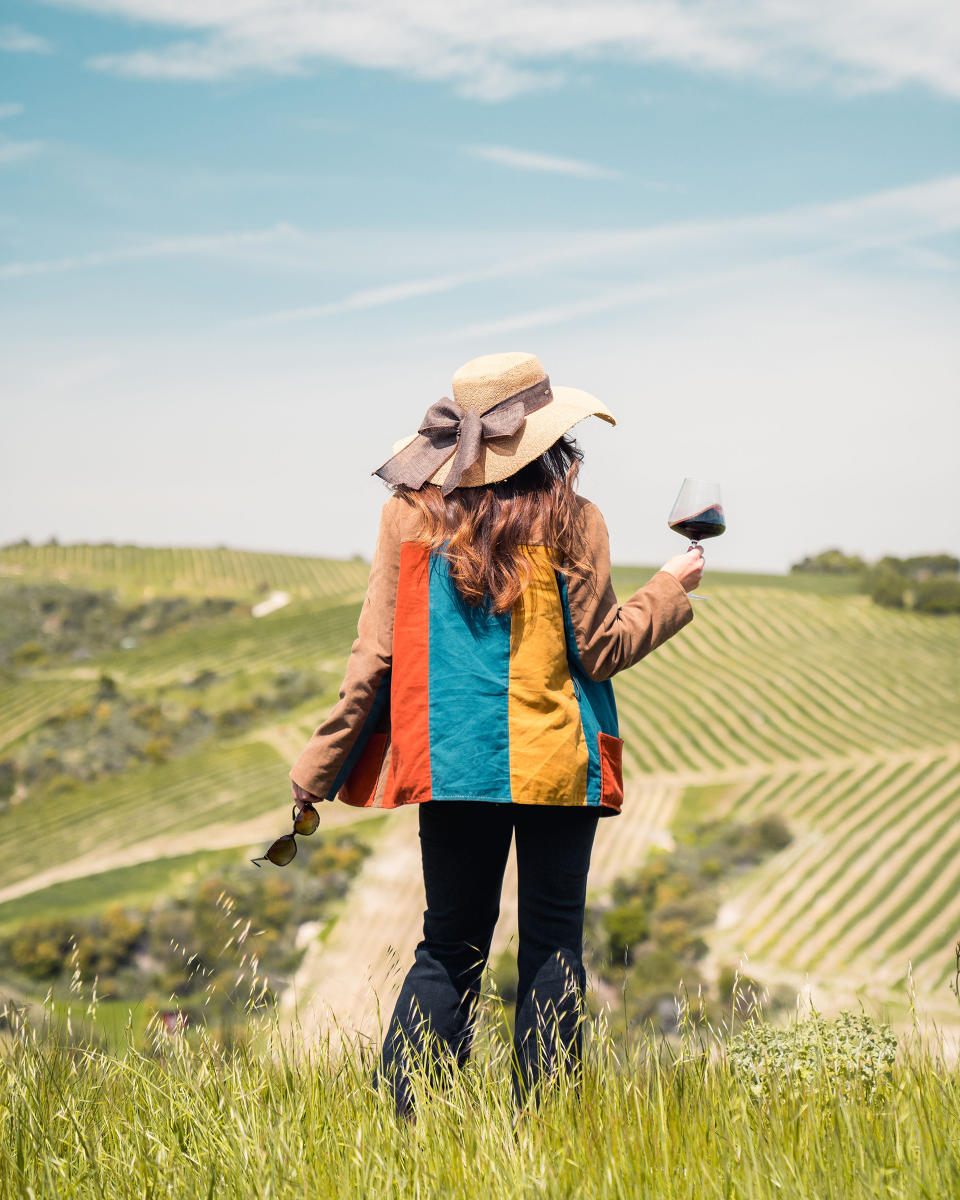 girl overlooking the vineyards at Daou Winery