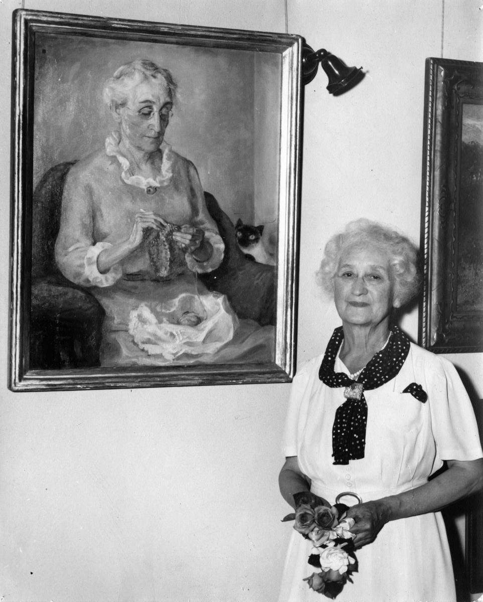 Olive Rush with portrait of Emma Beasley, taken when Rush received an honorary Doctor of Arts degree from Earlham College, Richmond, Indiana around 1947, New Mexico Magazine