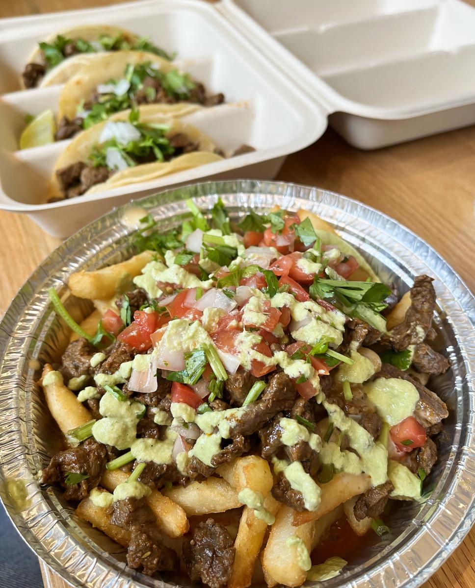 loaded fries and three street tacos