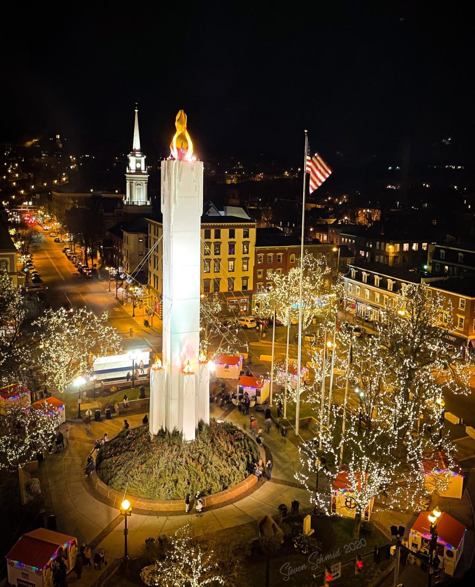 The Peace Candle lit in Easton's Centre Square as part of Easton Winter Village.