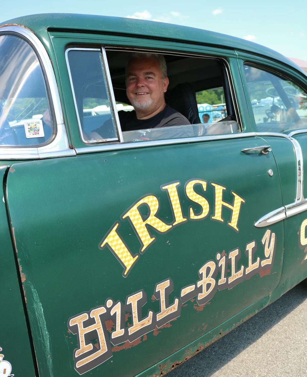 A man inside his racing car, the "Irish Hill-Billy" at the Tri-Five Nationals race at Beech Bend Raceway in Bowling Green, Ky.