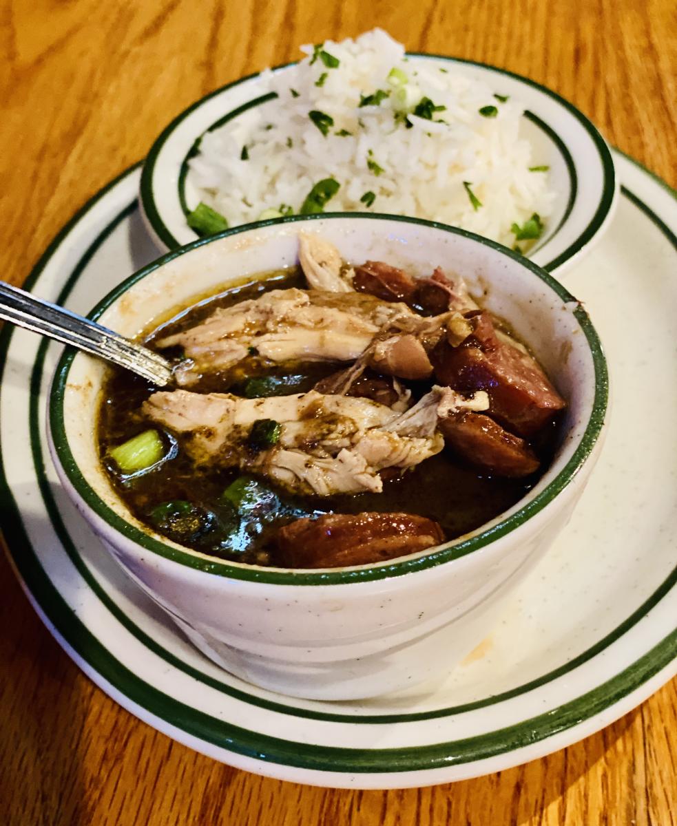 Bowl of gumbo with a side of rice at Floyd's in Beaumont