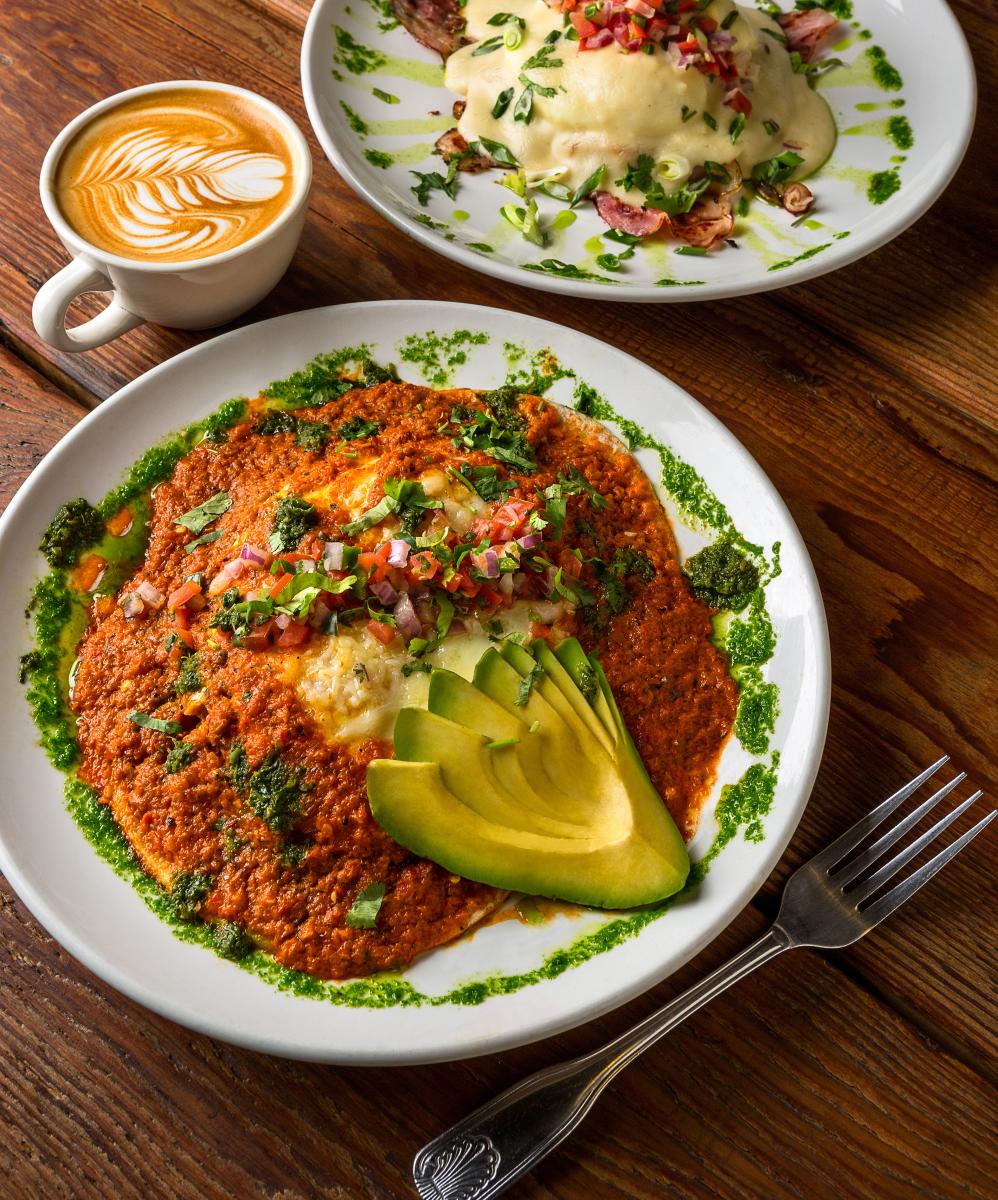 plate of Huevos Rancheros and hot latte with beautiful milk design