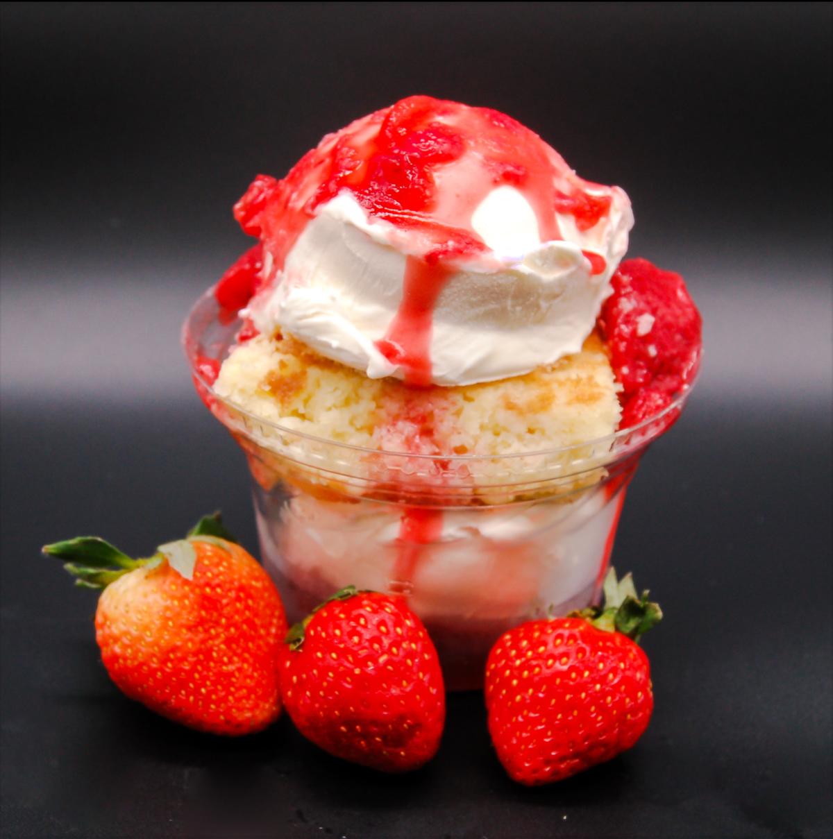 strawberry shortcake ice cream cup from Campbells Frozen custard with 3 fresh strawberries
