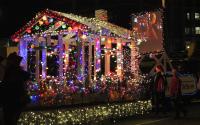 Parade float lit up with Christmas Lights