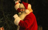 Santa waiving during the Athens Parade of Lights