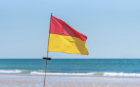 red and yellow beach flag