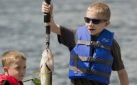 Boy catches fish