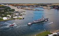 The U.S.S. Paul Ignatius makes her way through the entrance channel at Port Everglades.