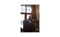 Caitlin Cheney speaking at the Annual Meeting