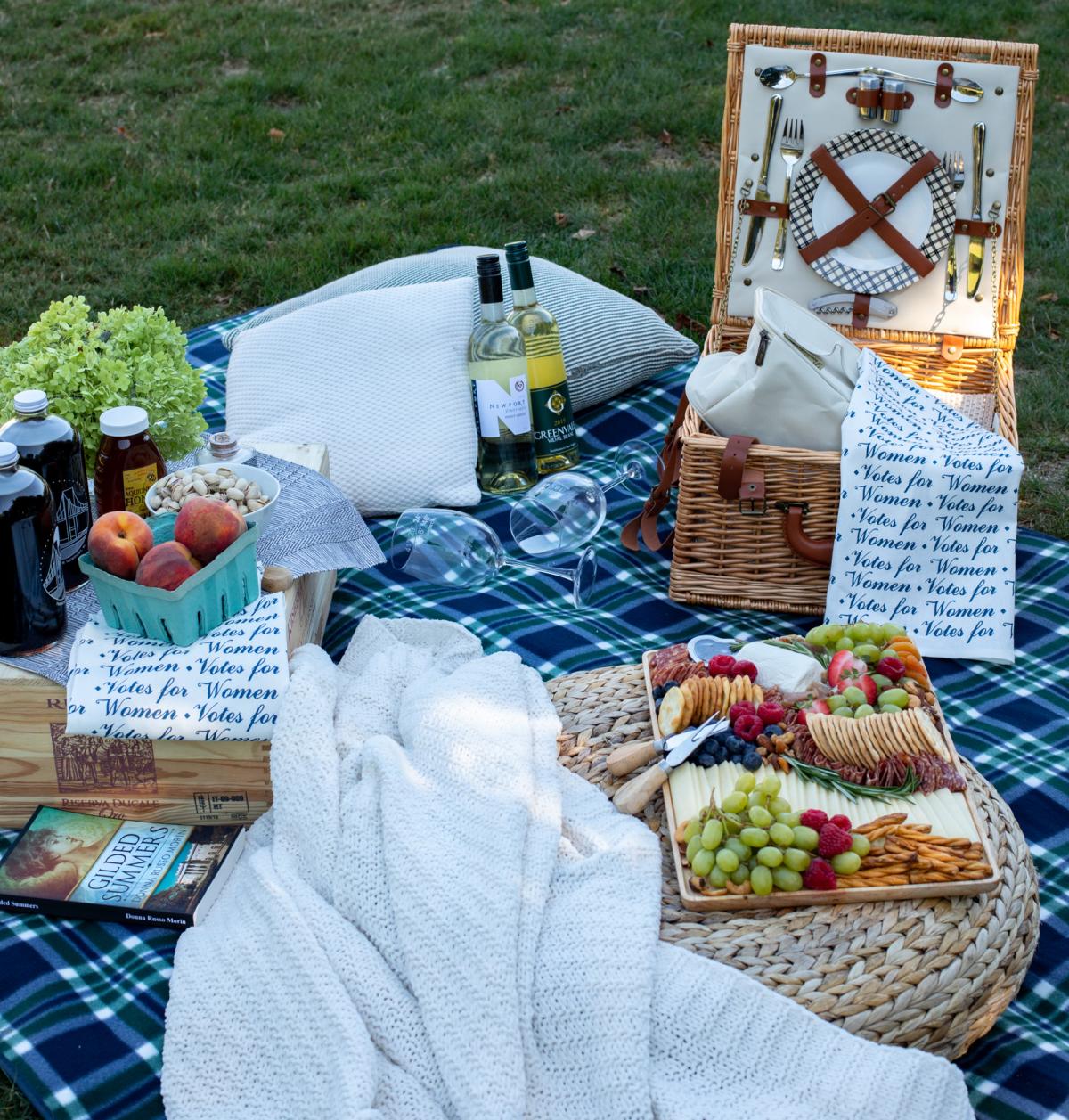 Picnic Blanket With Food, Peaches And Wine Glasses 