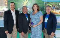 Restaurant Front of House Hero Nicki Scansarole with Commissioner Chris Constance, John Lai with FRLA, and Sean Doherty, Director of Tourism