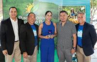 Nino and Lolis Perez-Rojas with Commissioner Chris Constance, John Lai with FRLA, and Sean Doherty, Director of Tourism