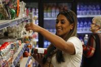 A woman shops for treats at the Nifty Nuthouse