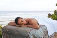 Woman laying on a massage table at a Daytona Beach Spa