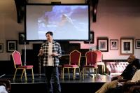 Speaker standing talking to delegates