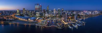 An aerial image of the Perth city skyline lit up at night