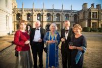 Delegates enjoying a drinks reception on the lawn at King's College, Cambridge.