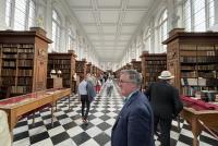 Visitors inside the Wren Library, Trinity College