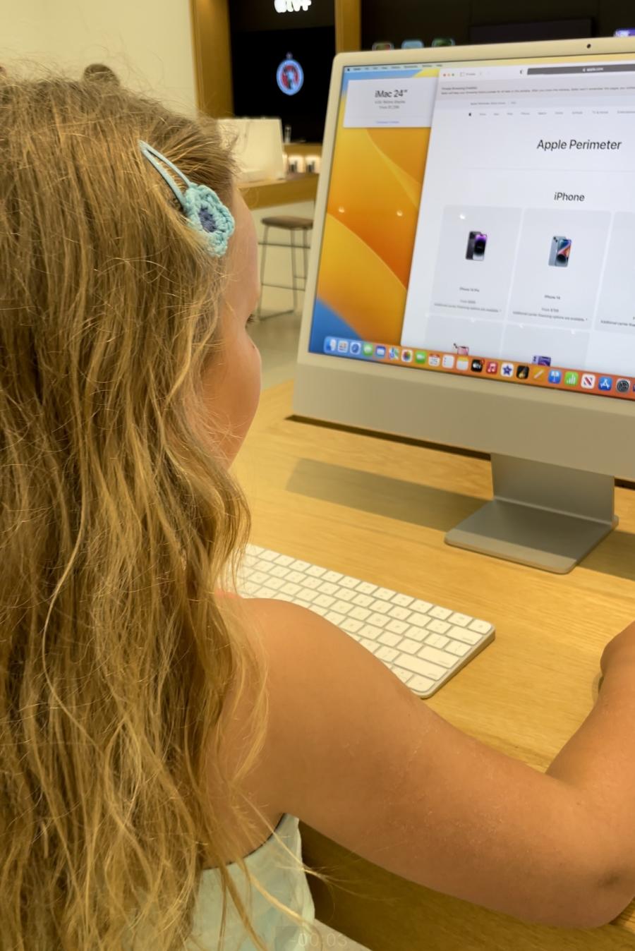 Girl at Apple Store on Computer