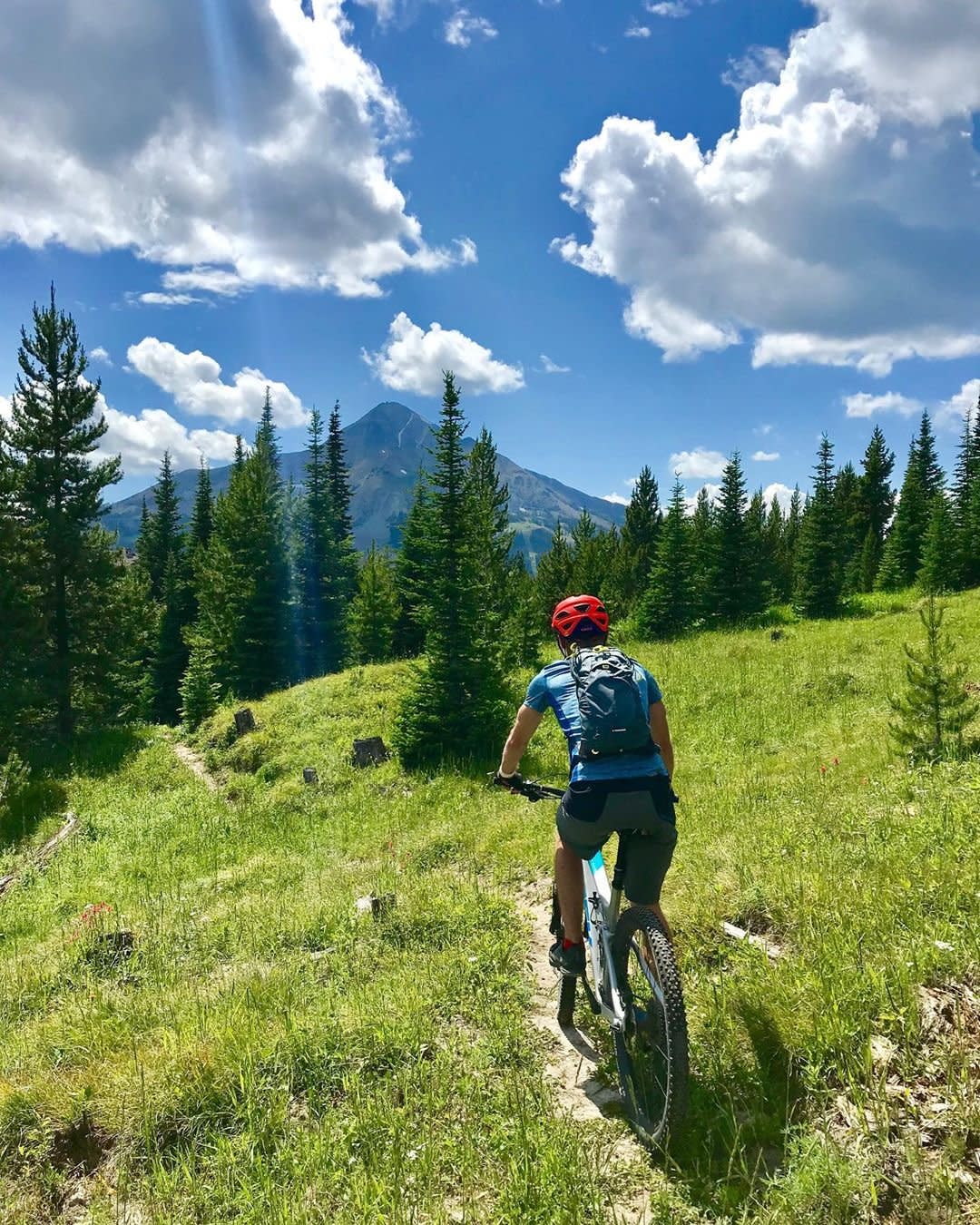Photo by user dhirschi, caption reads Just me and my guy under one Big Sky! 👬

#bigsky #mtb #montana #summerdays #happyplace